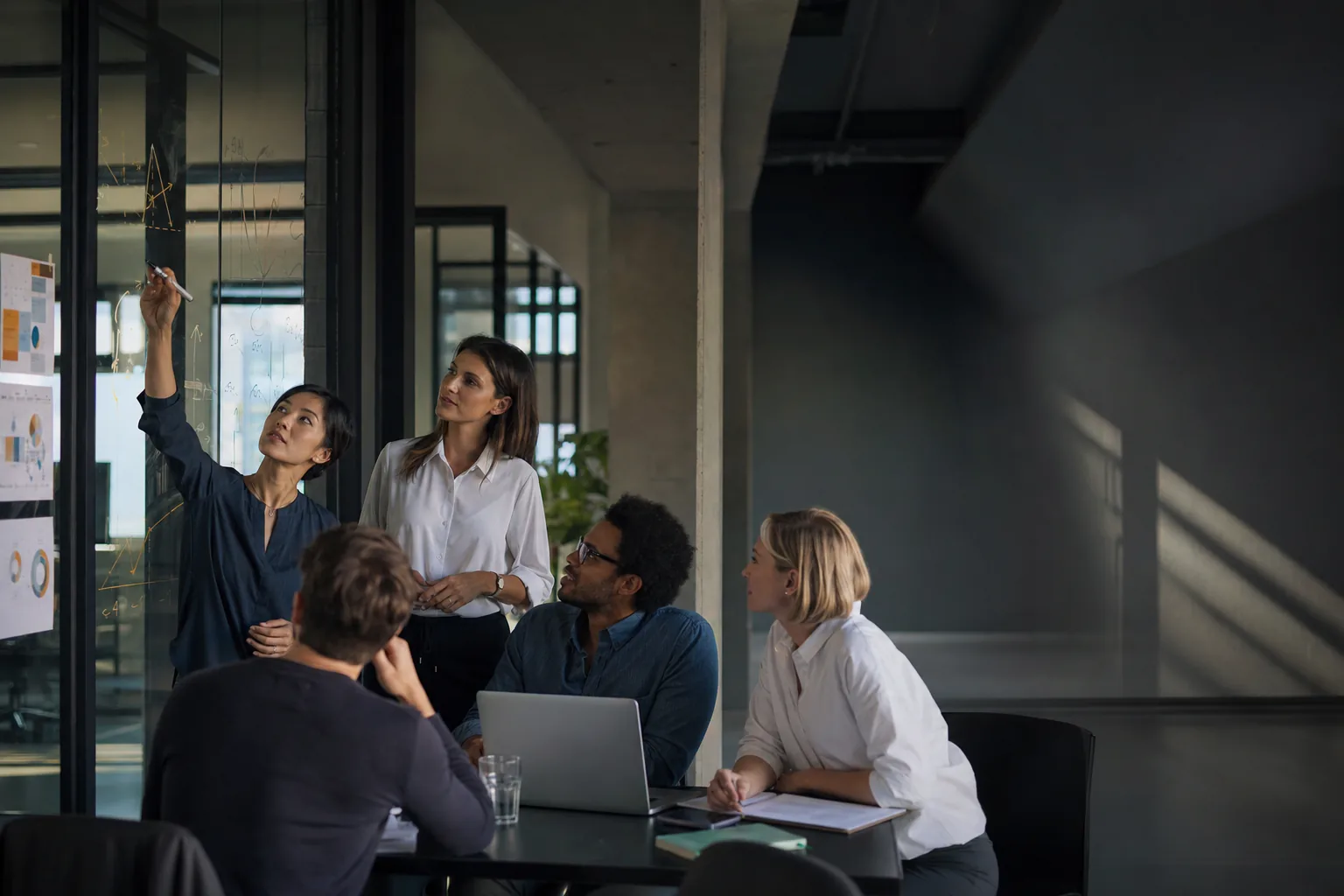 Technology team collaborating in a modern studio